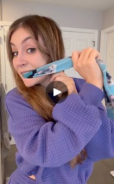 7.8M views · 103K reactions | this is incredible! (Easy Hair Trick) | this is incredible! (Easy Hair Trick) | By Brooklyn B | A sock and put it in your
mouth. Then prepare your hair. Take your sock and bring it
over to your hair and twist your hair around the sock until
you reach the bottom. Pinch tight. Bring the sock out of
your mouth and then take the bottom and bring it up over
top. Do the same on the other side. You want to make sure
that your hair is blow dried nice for this. That's how you
get the best results. So here you can see I'm doing this
twice looping it over good. Now simply sleep in this. Alright,
it's the next morning. So now it's time to unwrap these and
see what they did. Wow. Okay, let me do the next
one. Is incredible. Okay so I'm just
going to spread this out. This u