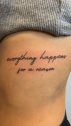 a woman's stomach with the words everything happens for a reason written on it