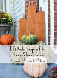 pumpkins and hay bales on the front porch with text overlay saying diy rustic pumpkin patch from a salvage fence