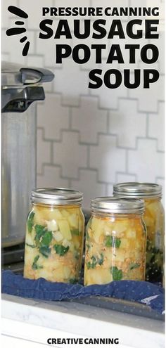 three jars filled with food sitting on top of a counter