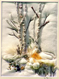 an image of some plants that are in the snow with white stuff on top of it