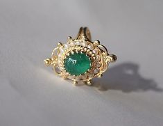 Vintage-14t. Yellow Gold, Pearl, & Emerald Ring | eBay Vintage Emerald Jewelry, Emerald Gold Ring Vintage, Antique Yellow Gold Emerald Ring, Antique Emerald Ring In Yellow Gold, Antique 14k Stamped Emerald Ring, Emerald Pearl Ring, Vintage Cabochon Emerald Ring For Anniversary, Antique Cabochon Emerald Wedding Ring, Heirloom Style Open Emerald Ring For Formal Occasions