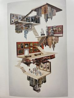 a collage of books and pictures on a white wall with stairs leading up to the top floor