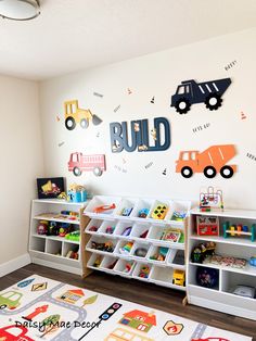 a child's playroom with toys and bookshelves on the wall in front of it