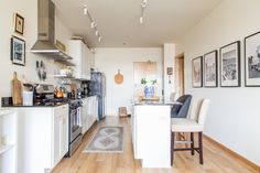 the kitchen is clean and ready to be used as a dining room or living room