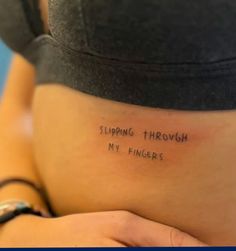 a pregnant belly with writing on it that says, suppling through my fingers