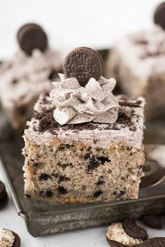 a piece of cake with oreo cookies on top