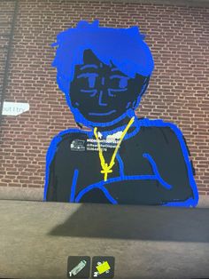 a drawing of a person with blue hair and yellow necklaces on the side of a building