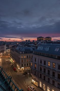 an aerial view of the city at dusk