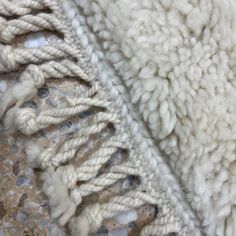 closeup of white wool and lace on fabric