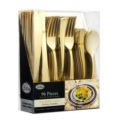 a box filled with lots of gold colored forks and spoons next to each other