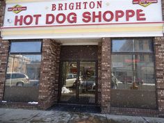 the front entrance to brighton hot dog shoppe