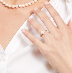 This beautiful pearl ring features a lustrous AAAA quality 7-8mm white Freshwater pearl, imported directly from the pearl farms of China. The pearl is mounted with dazzling SI clarity diamonds on a 14K gold band.
This ring is available in a number of sizes for the perfect fit. Classic White Pearl Open Ring, Elegant Pearl Rings With Pearl Chain, Elegant Pearl Chain Ring, Classic White Pearl Ring, Formal Pearl White Open Pearl Ring, Formal Pearl White Open Ring, Formal Open Pearl Ring, Classic Pearl White Open Ring Jewelry, Timeless Pearl White Pearl Ring