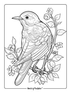 a bird sitting on top of a tree branch with leaves and flowers in the background