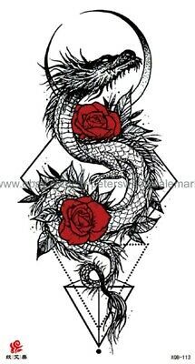 a tattoo design with roses and a dragon on it