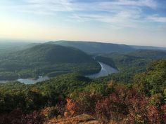 a scenic view of a river in the distance