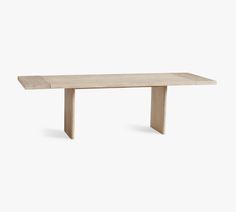 a wooden table on a white background with no one around it or the table top