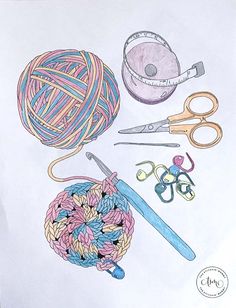 crochet supplies displayed on white paper with scissors and ball of yarn in background