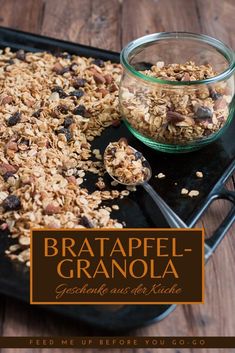 granola in a glass bowl on a baking tray