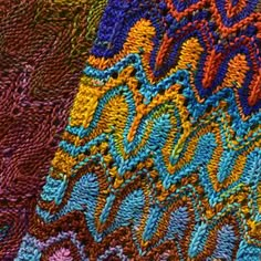 an image of colorful crocheted material that looks like something out of the book