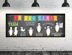 penguins are standing in front of a blackboard with words on it