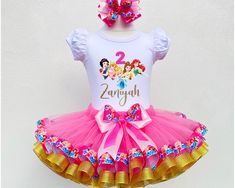 I offer you a beautiful birthday tutu outfit girls. NOTES FOR THE SELLER -Number for personalizing the top. -Name to personalize the vertex. -Need by date. Sleeve for the top - short, long. TOP. The top of it is 100% cotton. Size 3-24 months it is a bodysuit, 2T-10T it is a shirt. (Since it is more handmade always remember the shirt needs to be washed inside out, hand washed and air dried). SKIRT - made of soft tulle, edged at the bottom with a ribbon and decorated with a bow. Tutu is planted on Disney Princess Birthday Outfit, Princess Style Fitted Tutu Dress For Birthday, Multicolor Princess Tutu Dress For Birthday, Princess Tutu Dress With Bow For Birthday, Multicolor Princess Tutu Dress For Dress-up, Baby Princess Birthday Tshirt, Disney Princess Embroidered Birthday Shirt, Birthday Tutu Outfit, Princess Tutu