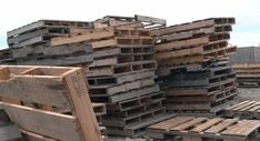 several wooden pallets stacked on top of each other