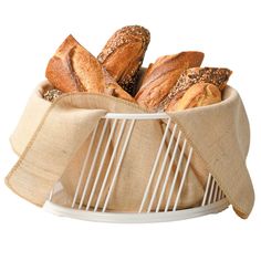 a basket filled with loaves of bread