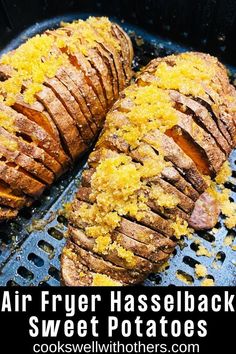 air fryer hasselback sweet potatoes in it and is ready to be cooked