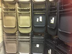 there are many plastic containers stacked on each other