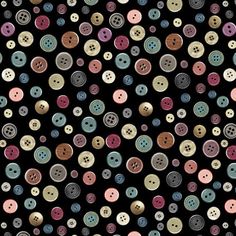 many different colored buttons on a black background