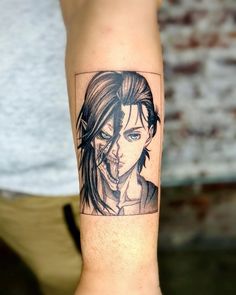 a woman's arm with a black and white drawing of a girl on it