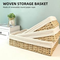 the woven storage basket is made of removable round paper rope and holds two folded towels