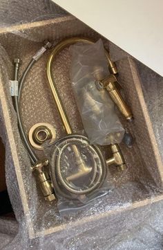 an open box with a hose in it