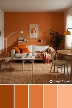 an orange living room with white furniture and wood accents, including a couch, chair, table