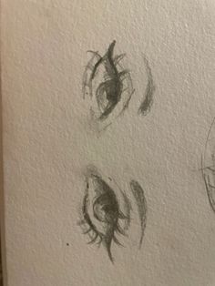 three different types of eyes are shown in this drawing technique, one is drawn on paper and the other is made out of graphite