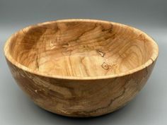 Another gorgeous Spalted Maple Hand-Turned Bowl from the Harres Maker Shop! Made from extremely figured spalted maple wood, each bowl is a one-of-a-kind masterpiece, blending nature's charm with expert craftsmanship. This bowl is a perfect 11.5 inches wide and stands tall at 4.5 inches, making it both practical and pretty. Its smooth finish highlights the stunning grain patterns and rich colors found in spalted maple wood. Use it as a centerpiece, a fruit bowl, or simply as eye candy for any roo Spalted Maple, Maker Shop, A Fruit, Stand Tall, Rich Colors, Maple Wood, Fruit Bowl