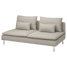 a couch with two pillows on it and one arm folded back to the other side