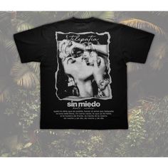 a black t - shirt with an image of marilyn monroe