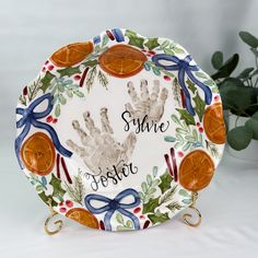 a plate with a hand print on it