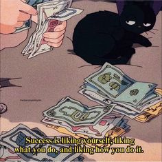 a black cat sitting on top of a pile of money next to a person holding cash