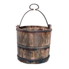 an old wooden bucket with metal handles