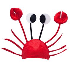 a red crab hat with eyeballs on it's head and two black eyes