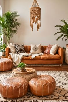 a living room filled with lots of furniture and potted plants on top of it