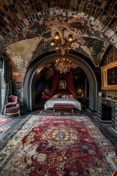 a bedroom with a large rug and chandelier hanging from the ceiling above it