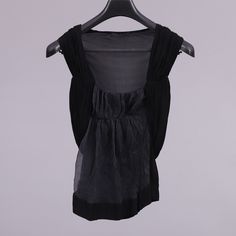 Donna Karan ladies vintage black silk sleeveless vest top-EU 34-UK 6-US 2-circa 1990s (Weight: 202g) free postage The top is made of silk and is in excellent condition with the following approximate measurements: Overall length (from behind edge to edge): 54cm; Chest (armpit to armpit): 36cm FREE POSTAGE WORLDWIDE Black Silk V-neck Camisole, Fitted Sleeveless Blouse Vest For Layering, Black Silk Sleeveless Tank Top, Black Silk Camisole Top, Black Sleeveless Blouse Vest For Layering, Black Sleeveless Top For Layering, Black Camisole Vest For Summer, Black Silk Camisole Chic Style, Fitted Vest For Summer Layering