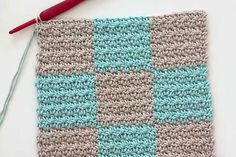 the crochet square is made up of two different colors