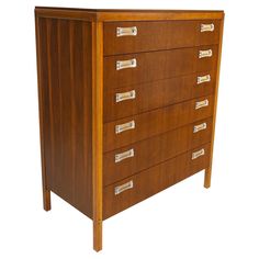 a wooden dresser with five drawers on each drawer