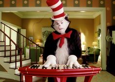 the cat in the hat is playing piano