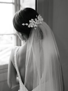 the back of a bride's dress and veil